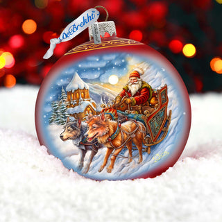 a christmas ornament with a santa on a sleigh
