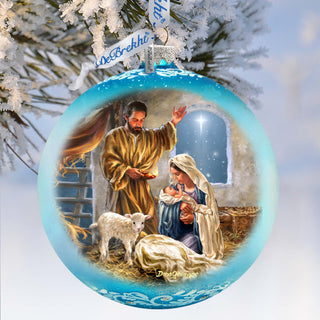 a christmas ornament with a nativity scene on it