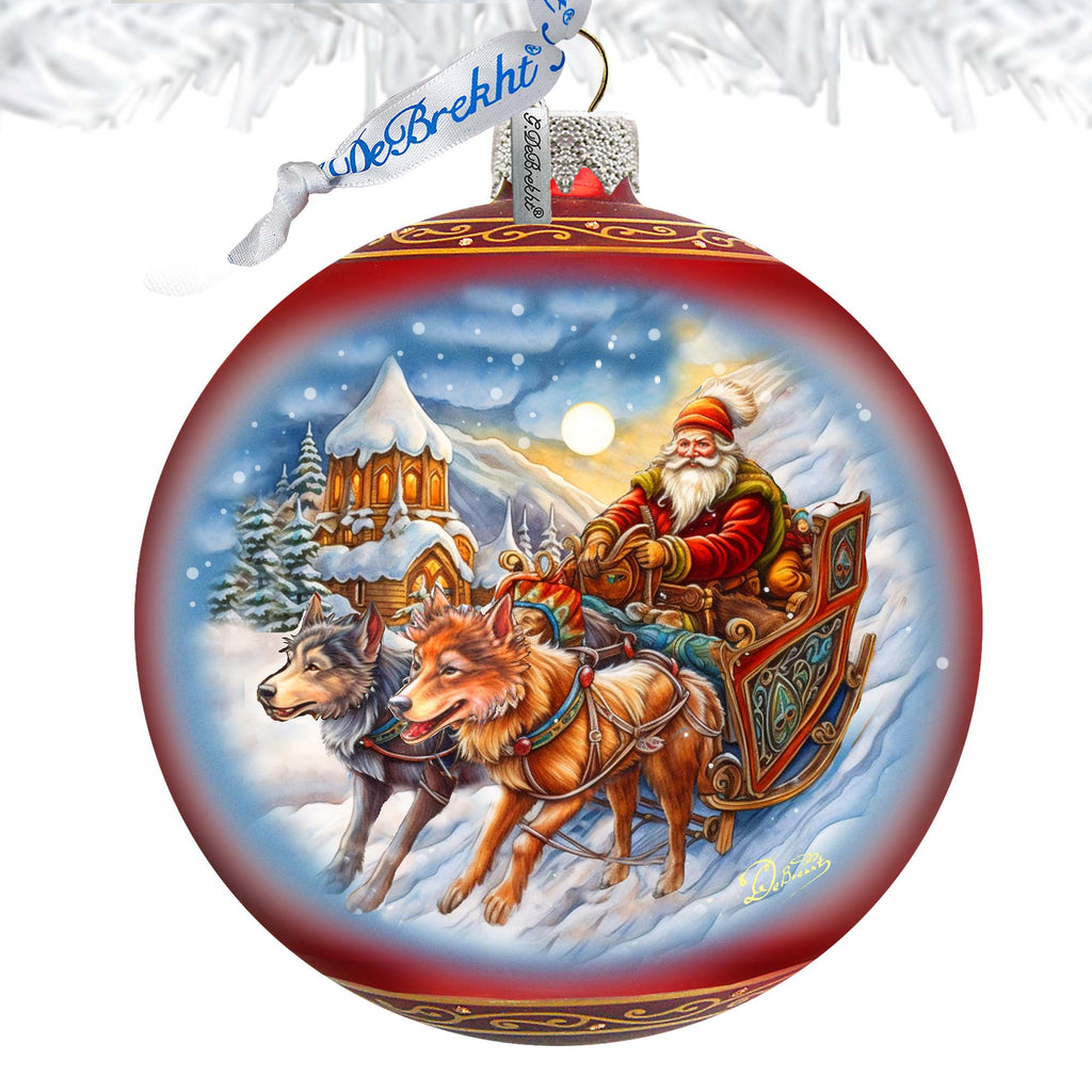 a christmas ornament with santa riding in a sleigh