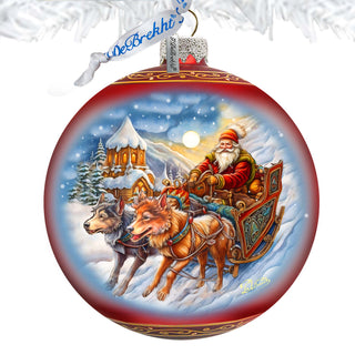 a christmas ornament with santa riding in a sleigh