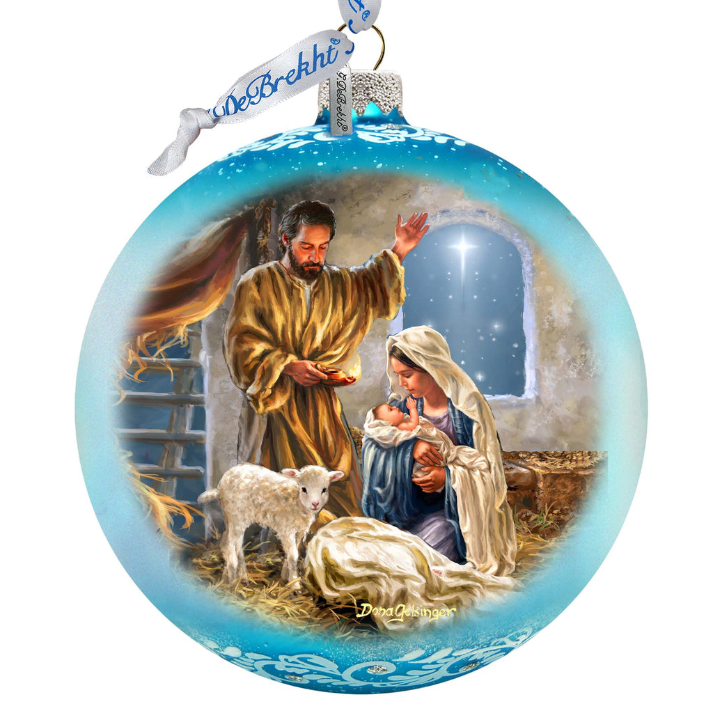a christmas ornament with a nativity scene on it