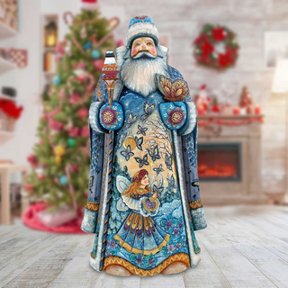 A colorful and detailed figurine of Santa Claus, adorned with intricate patterns and designs, stands in a room decorated for Christmas.