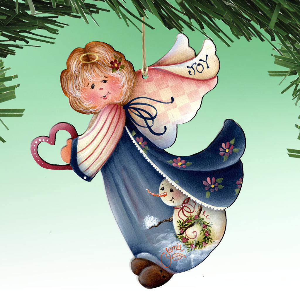 A hand-painted ornament depicting a smiling angel holding a heart and a snowman, with the word 