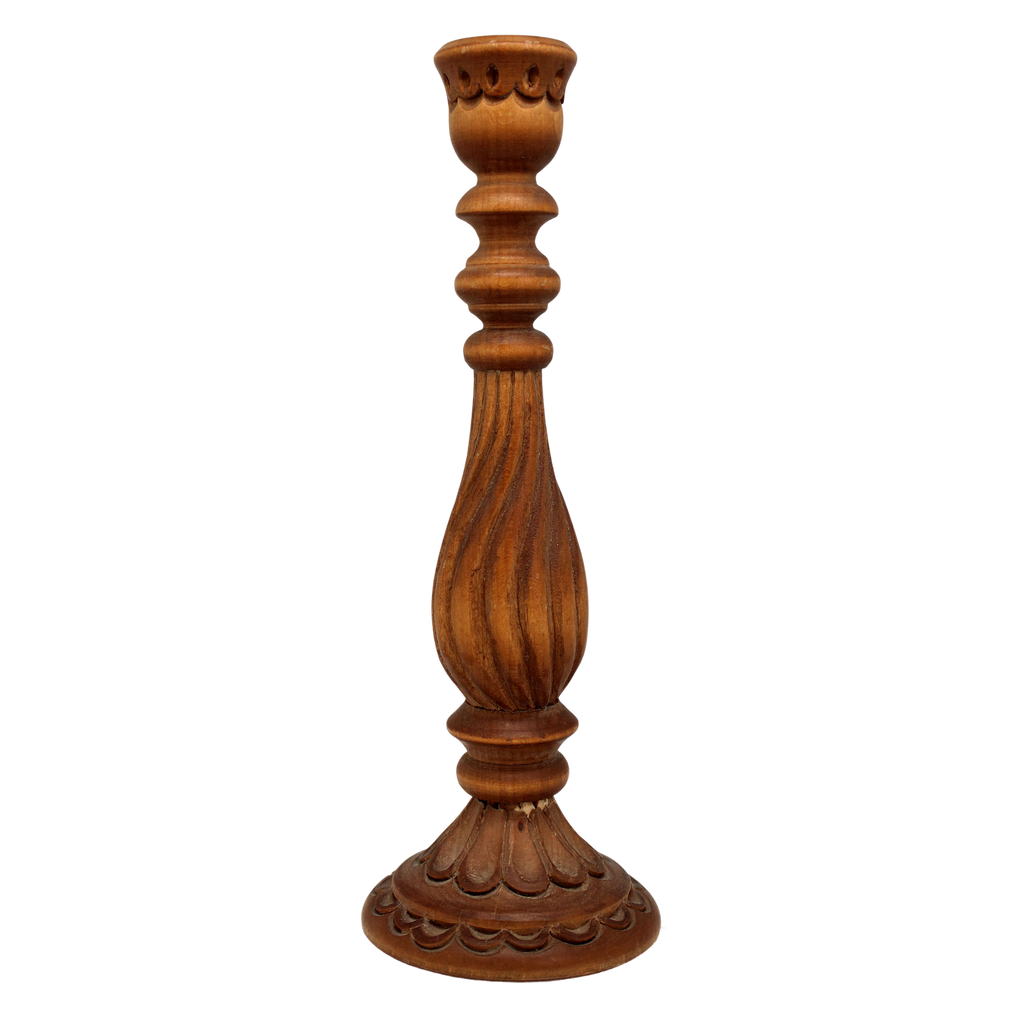 A wooden candlestick with a tall, slender design and a decorative base.