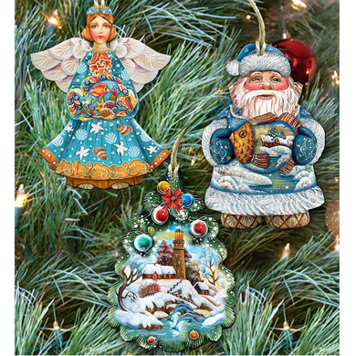 a Christmas tree decorated with ornaments, including a painted angel, a painted Santa Claus, and a painted Christmas tree ornament.