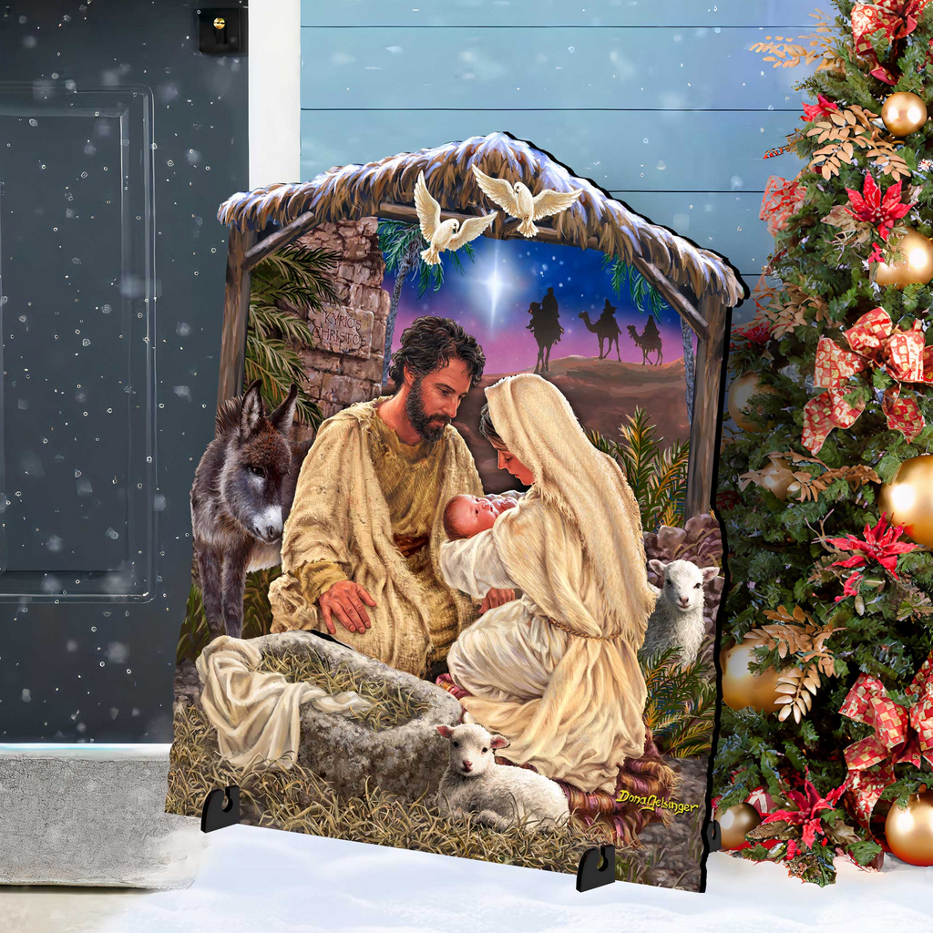 A nativity scene depicting the birth of Jesus Christ, with the mother, father, baby, and animals in a snowy landscape.