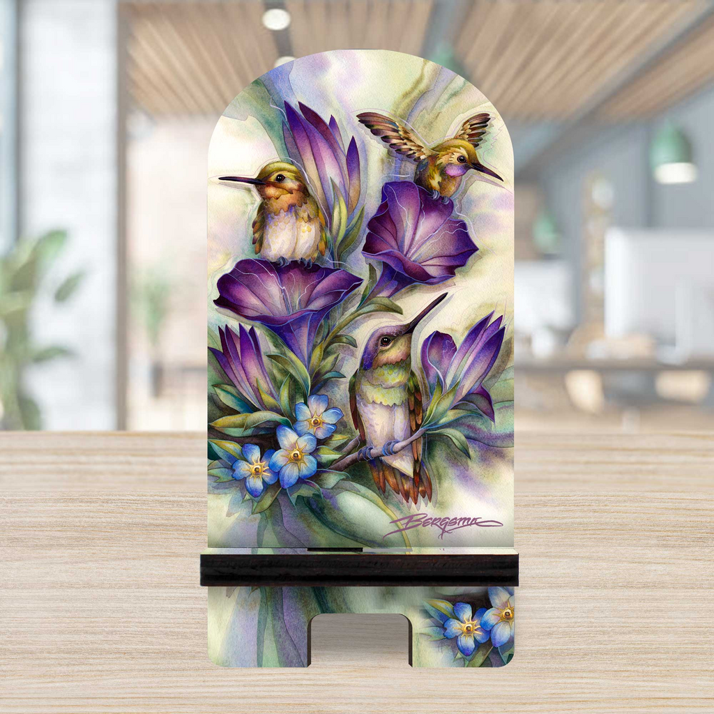 A wooden stand displaying a vibrant painting of purple flowers and hummingbirds.