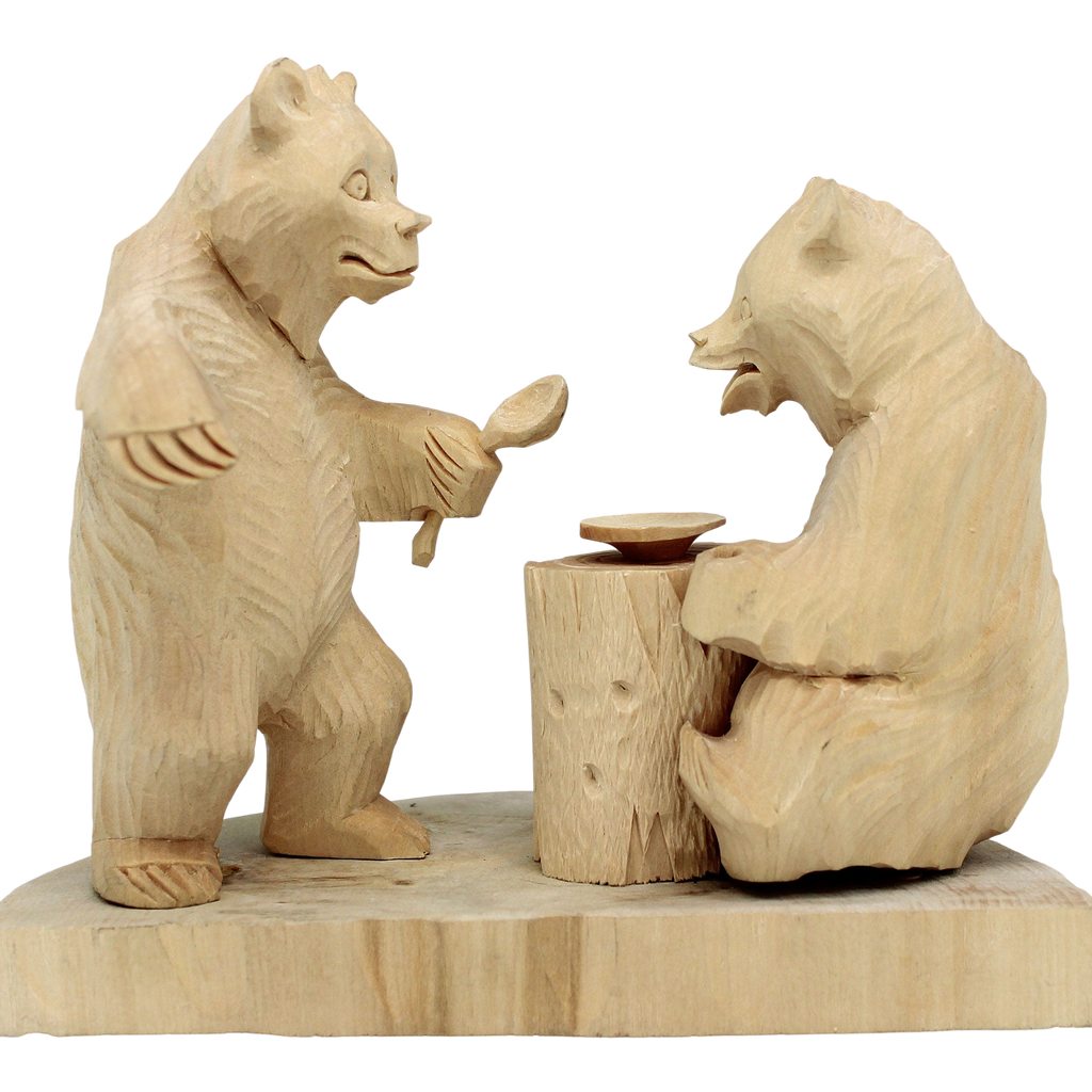 Two wooden bear sculptures, one standing and one sitting, are depicted in a carved wooden display.