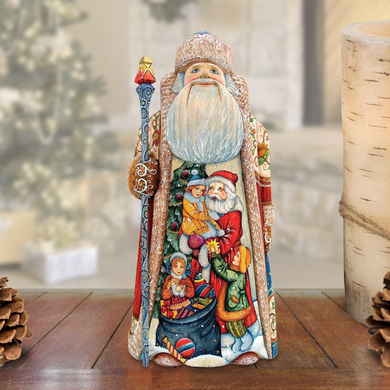 A hand-carved wooden Santa Claus figurine with a colorful, detailed design, standing on a wooden surface.
