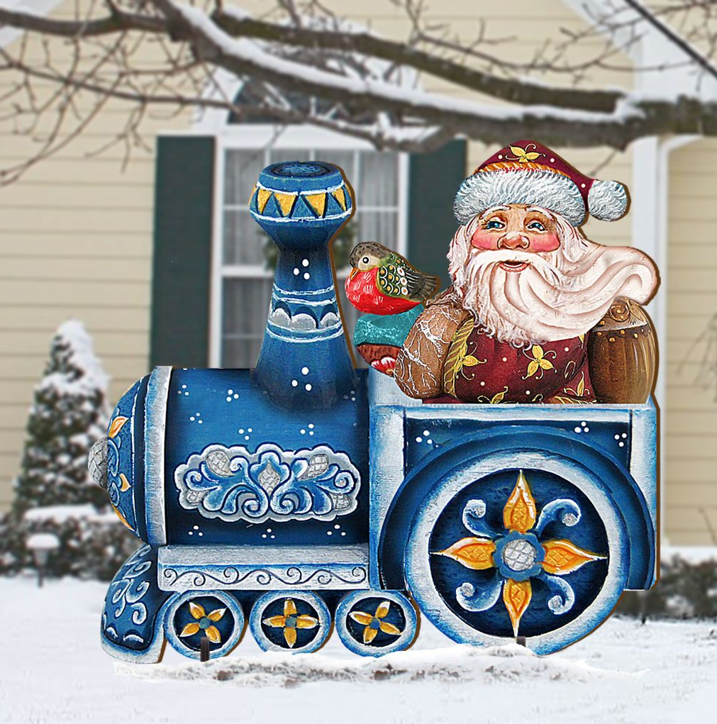A colorful and whimsical Christmas-themed train made of various materials, including wood and fabric, is depicted in the image. Santa Claus is seated on the train, and a bird is perched on the side. The train is set against a snowy background, creating a festive and holiday atmosphere.