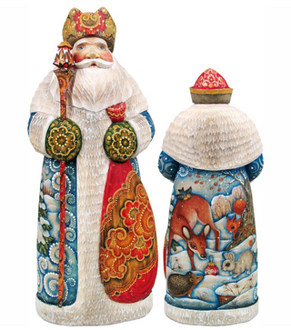 two colorful, intricately painted figurines of Santa Claus and a reindeer, both adorned with vibrant patterns and designs.
