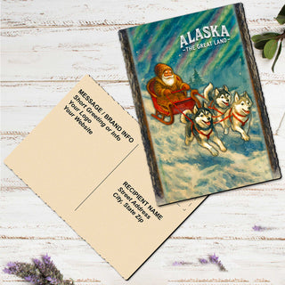 A postcard featuring an illustration of Santa Claus riding a sled pulled by three huskies, with the text 