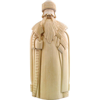 A wooden sculpture depicting a bearded man wearing a hat and holding a staff.