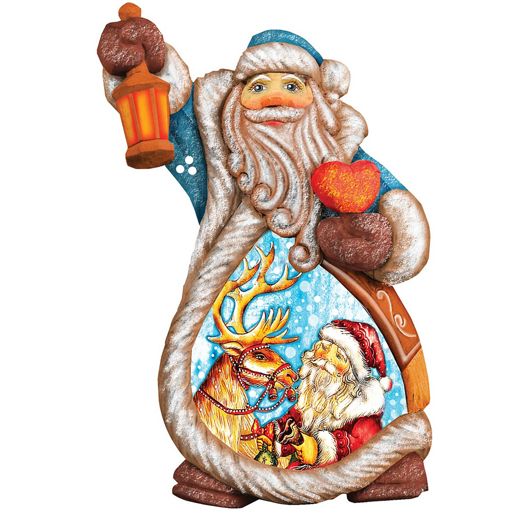 A wooden Santa Claus figurine holding a lantern and a heart, with a reindeer and snowflakes visible inside the Santa's pocket.