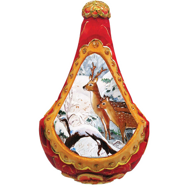 A decorative ornament with a red body and gold trim, featuring a painting of two deer in a snowy landscape.