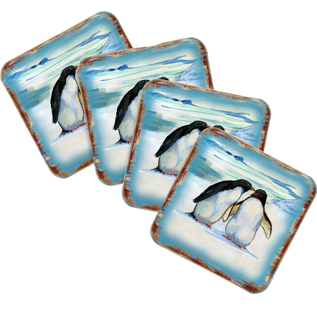 a collection of four square coasters, each featuring a penguin on a snowy landscape.