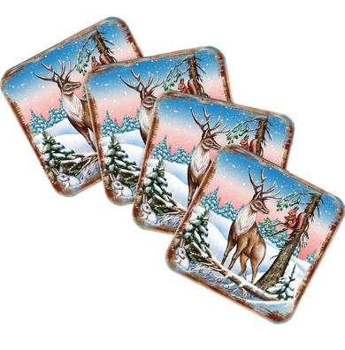 A set of four square coasters featuring a winter scene with a deer, snow, and pine trees.