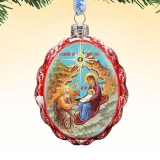 a round ornament with a religious scene depicting the nativity of the Virgin Mary and baby Jesus.