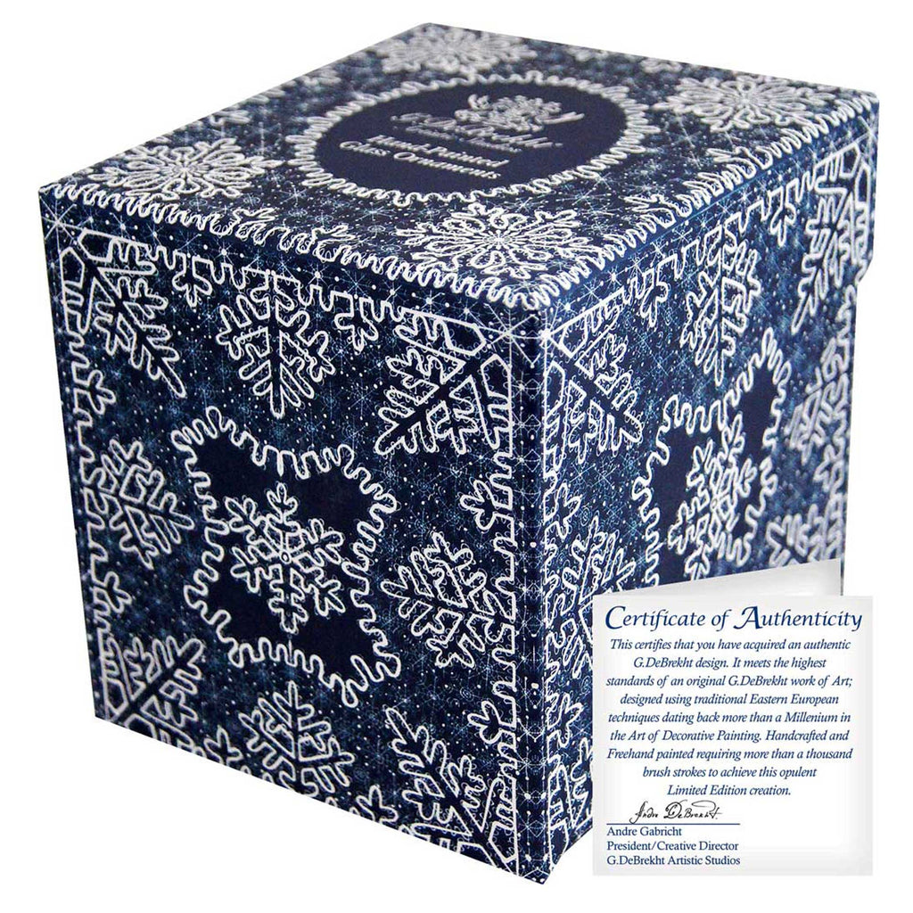 a box with a snowflake pattern and a certificate of authenticity.