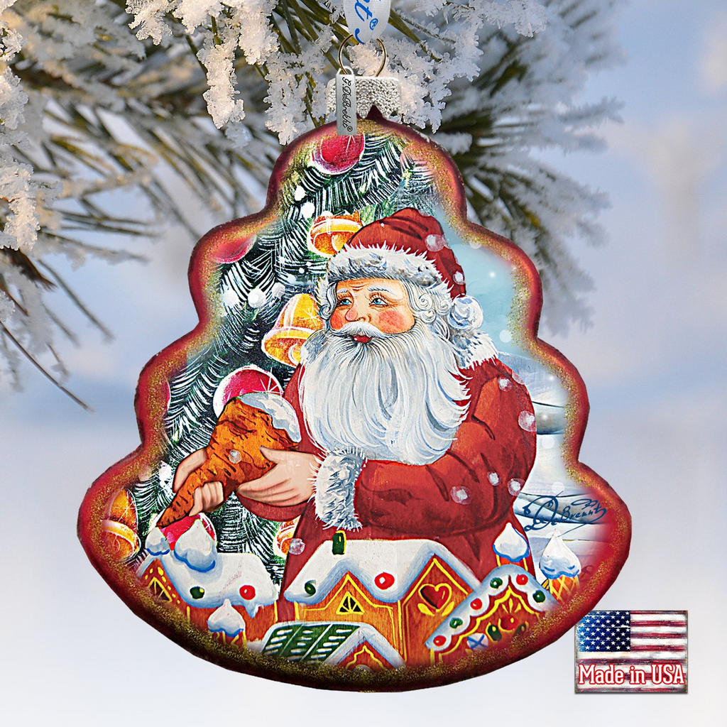 A Christmas ornament shaped like a tree with a Santa Claus figure holding a gingerbread man, set against a snowy background.