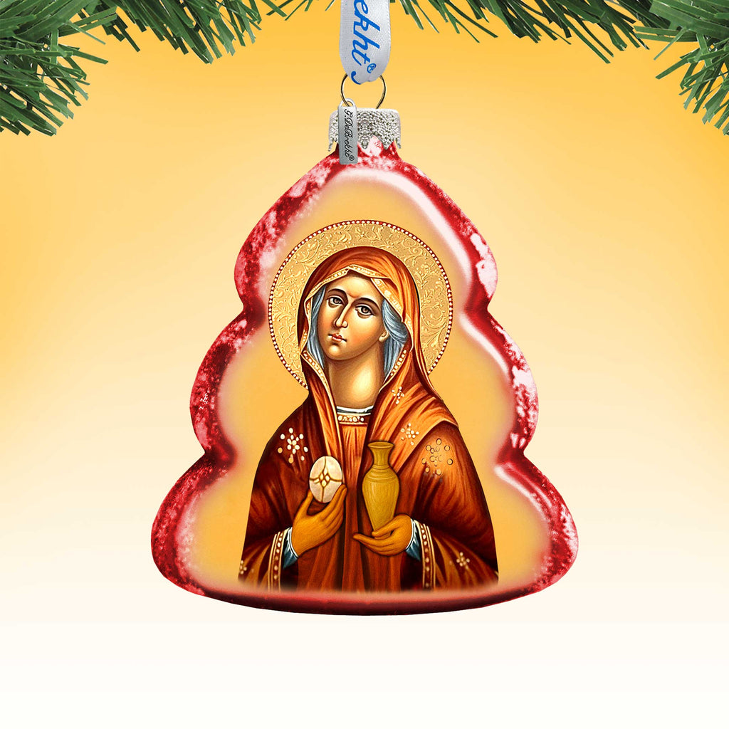 A Christmas ornament in the shape of a tree, featuring a religious icon of a saint.