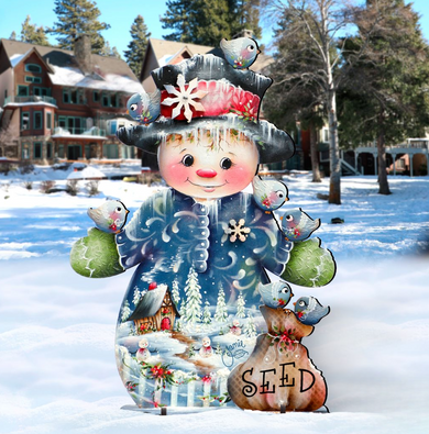 A whimsical snowman figure stands in a snowy landscape, adorned with a hat, scarf, and a bag. The snowman is surrounded by a group of birds, and the scene is set against a backdrop of houses and trees.