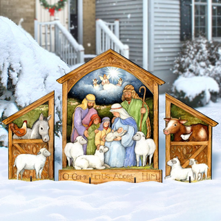 A wooden nativity scene depicting the birth of Jesus Christ, with figures of the Virgin Mary, Joseph, baby Jesus, and other animals surrounding the central scene.