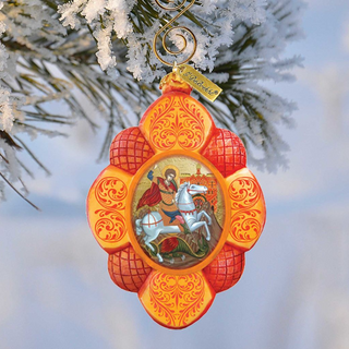 A decorative ornament hanging from a tree branch, featuring a central image of a person riding a horse.