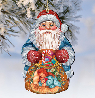 A colorful ornament depicting Santa Claus holding a bag of presents, hanging from a tree branch against a snowy background.