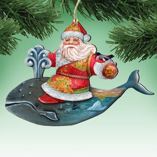 Santa Claus ornament with a whale and bird on a tree branch