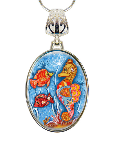 A pendant necklace with a circular design featuring a vibrant underwater scene with colorful fish and a seahorse.