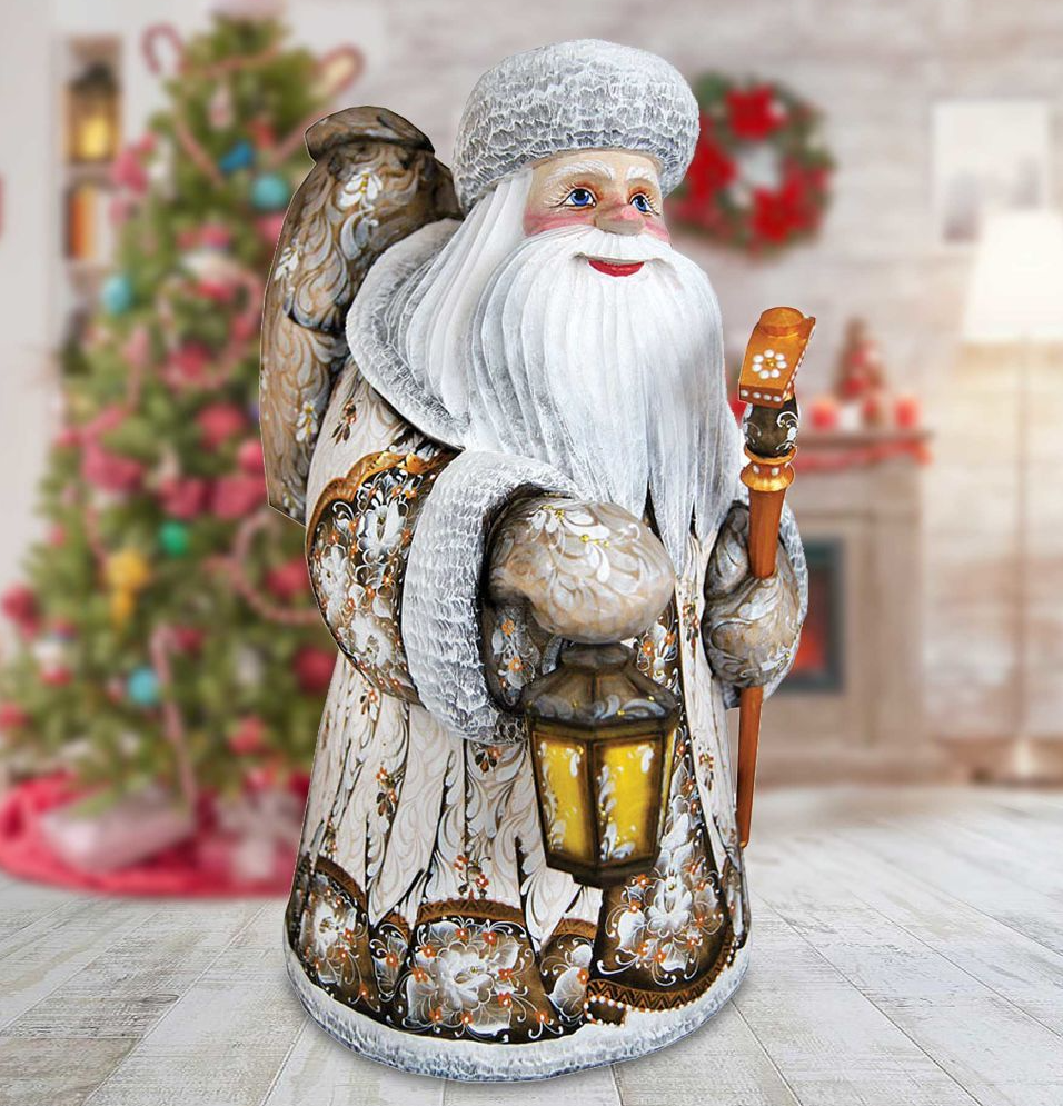 Holding Lantern Santa Woodcarved Figurine Unique hand carvings made from Linden wood. Fine details and beautiful artwork. Hand-Painted by world-renowned artists, limited edition collectibles. 820105