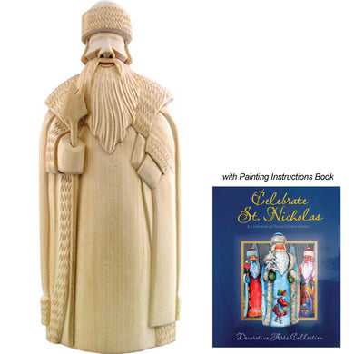 a carved wooden figure of St. Nicholas, a popular Christmas character, alongside a book titled 