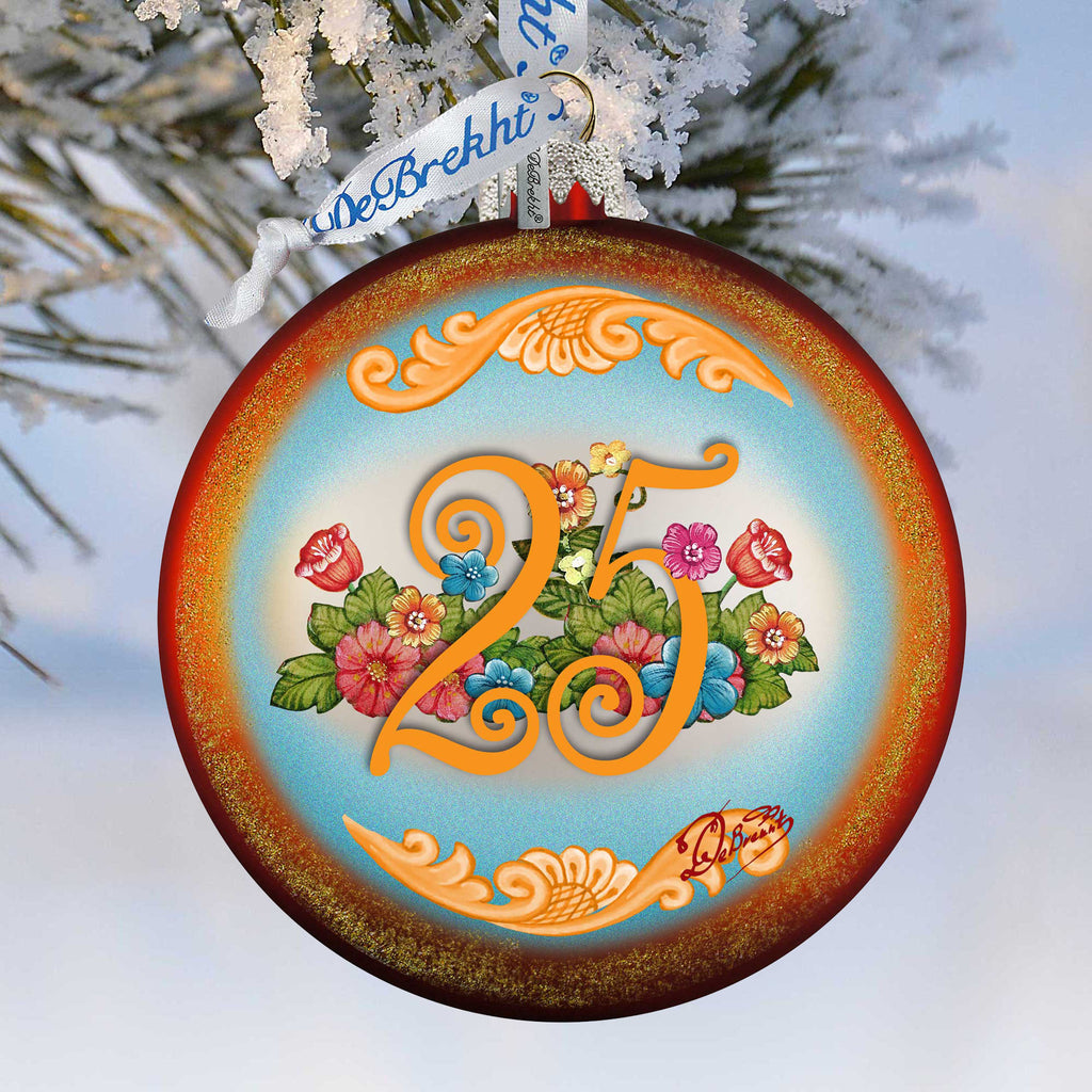 A decorative ornament with a blue and orange color scheme, featuring a floral design and the number 25 prominently displayed.