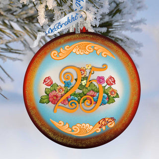A decorative ornament with a blue and orange color scheme, featuring a floral design and the number 25 prominently displayed.