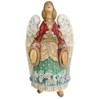 A wooden figurine of an angel with wings, wearing a red and gold dress and holding a heart-shaped object.