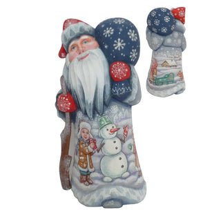 A hand-painted figurine of Santa Claus holding a snowman and other winter-themed characters.