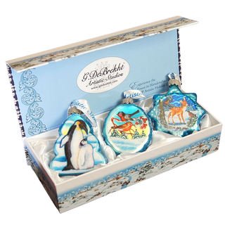 A set of three decorative ornaments in a box, each featuring a different animal and winter scene design.