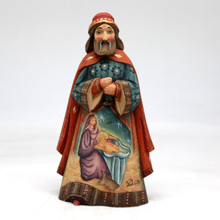 a figurine of a man with a cat