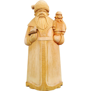 A wooden carving of Santa Claus holding a small bird, likely a robin, in his hand.