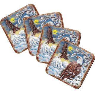 A set of four square coasters featuring images of eagles against a snowy mountain landscape with a full moon.