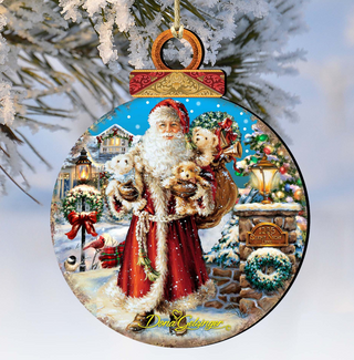 A round ornament featuring a painting of Santa Claus holding a sack of presents, surrounded by a snowy winter scene with a Christmas tree, lampposts, and other holiday decorations.