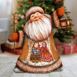 A wooden Santa Claus figurine holding a lantern and a basket of presents, with a Christmas tree in the background.