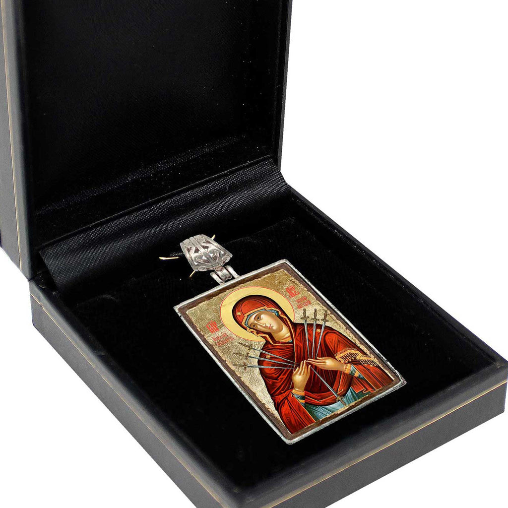 a religious icon, possibly a religious symbol or a religious figure, displayed in a black box.