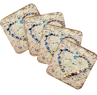 heart-shaped designs made of various colored stones, arranged in a row.