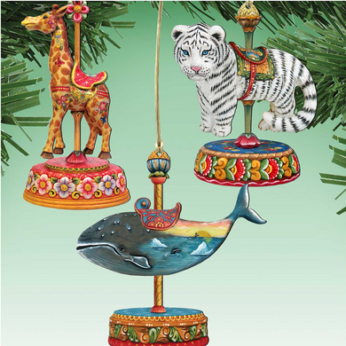 a collection of colorful and whimsical ornaments, including a giraffe, a tiger, a whale, and a carousel horse, all suspended from a string.