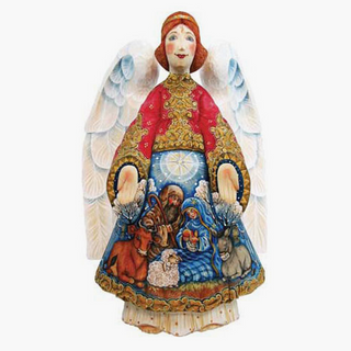 A figurine of an angel with wings, wearing a red and gold outfit, and holding a nativity scene with animals and people.
