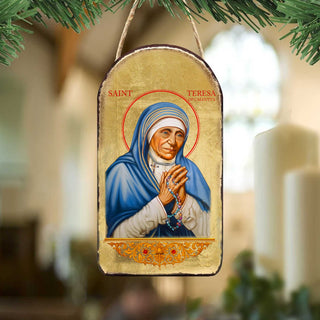 a religious icon of Saint Teresa of Calcutta, a prominent Catholic saint known for her dedication to serving the poor and sick.