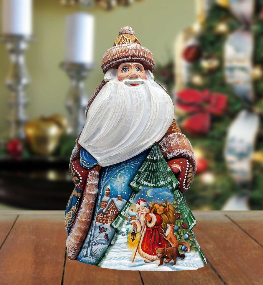 A colorful, hand-painted Santa Claus figurine with a white beard and hat, standing on a wooden surface.