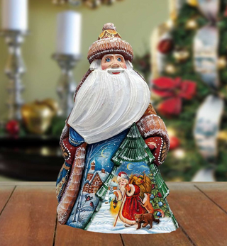 A colorful, hand-painted Santa Claus figurine with a white beard and hat, standing on a wooden surface.